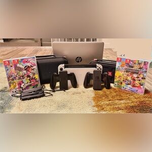 Looking to Trade: Nintendo Switch OLED + HP Laptop for MacBook or Gaming Laptop